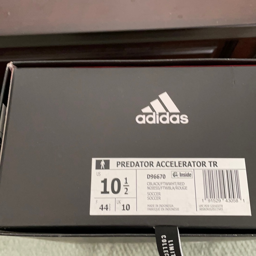 Adidas predator accelerator  shoe.